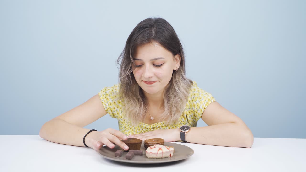 una persona que tiene dificultades para seguir un programa de dieta.