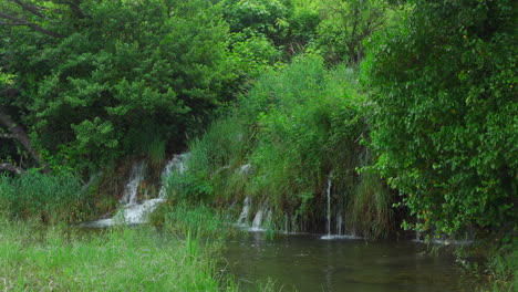 small waterfall in the greenery of krka national park