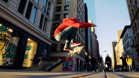skateboarder performing a trick in a city street