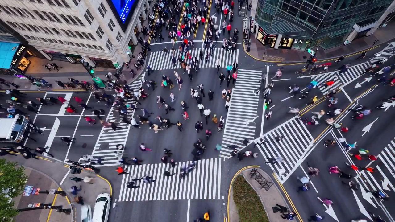 Aerial View of Busy Pedestrian Traffic at a City Intersection
