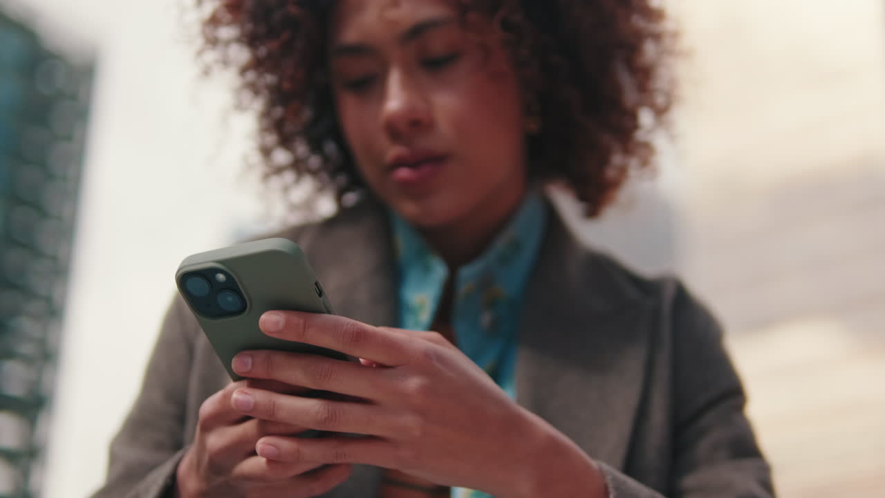 Woman Using Smartphone App Outdoors