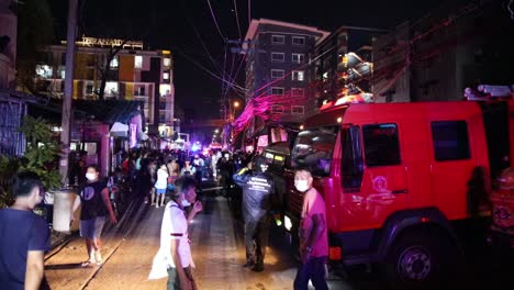emergency crew on scene to a fire in ratchada soi 36 bangkok, thailand