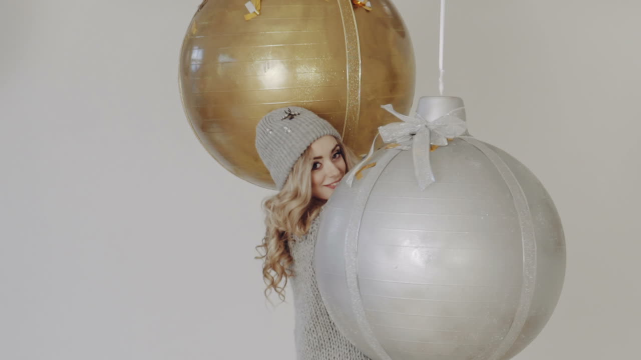 Woman showered with confetti. Young woman having fun and enjoy with colorful confetti