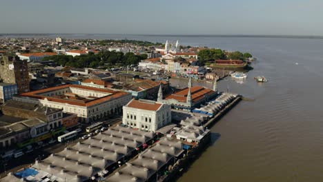an aerial drone view of the riverside open-air ver-o-peso market in belém, brazil.