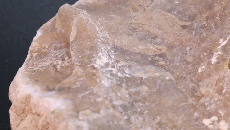 prehistoric flint stone macro shot with rotating motion, very close up view