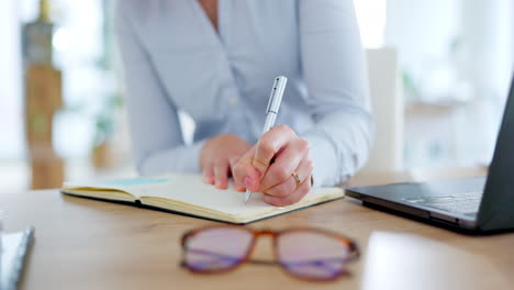 Woman-hands,-writing-notes