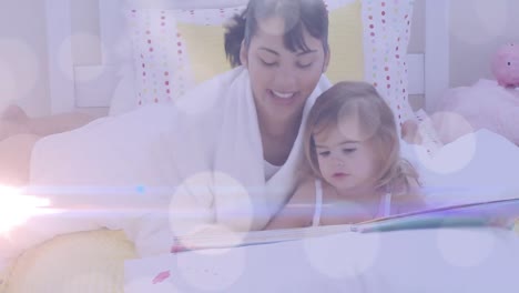 animation of light spots and trails over diverse woman and her daughter reading books