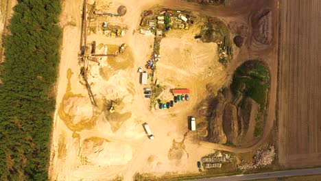 aerial view of sandpit and factory plant producing sand materials for construction industry