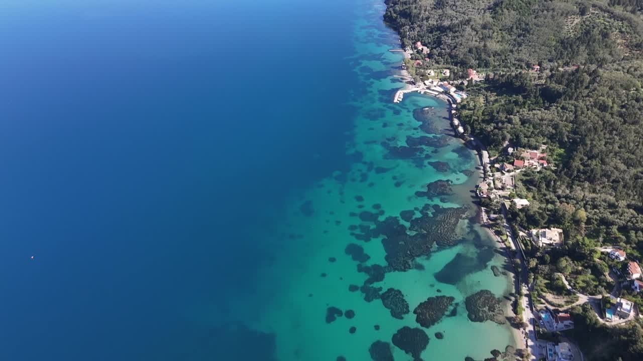 Drone footage of turquoise waters at Boukari Beach, Corfu, Greece