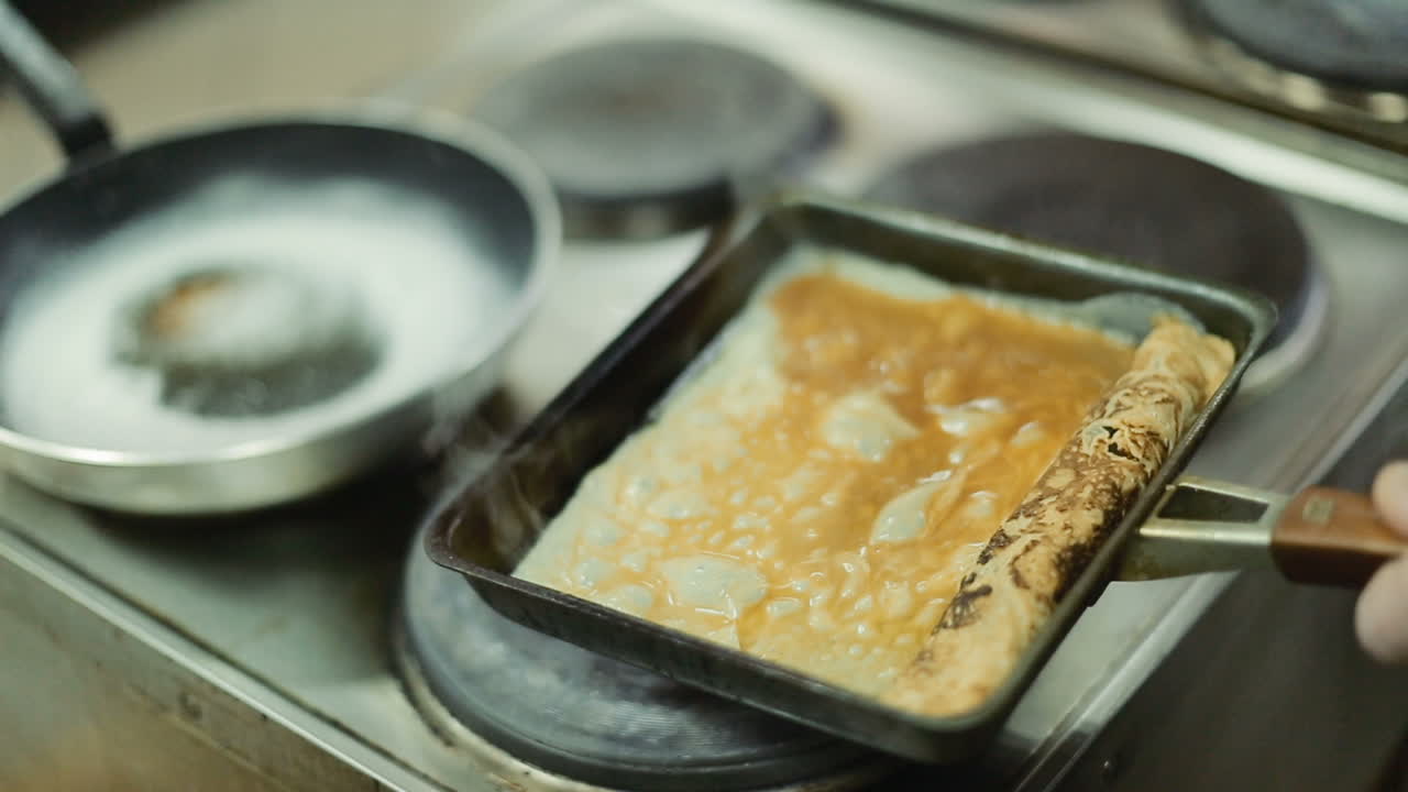 Delicacy In The Hands Of The Chief. Chief cook holding plate with delicacy