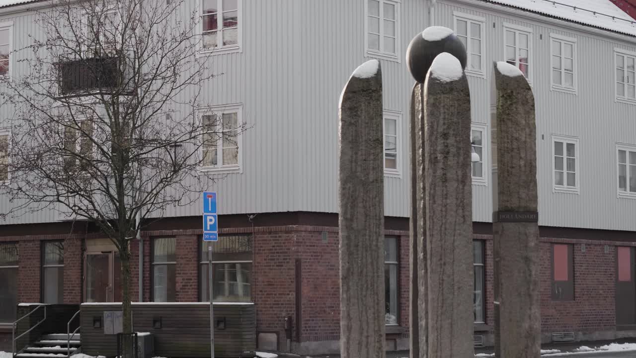 Urban sculpture and building at Hollandareplatsen, Gothenburg winter scene