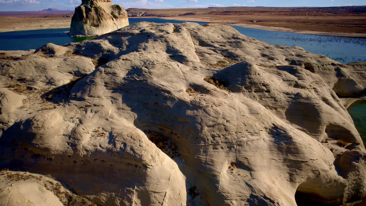 Inspire 3 drone shot flying over the surreal landscape of the american southwest canyonlands.
