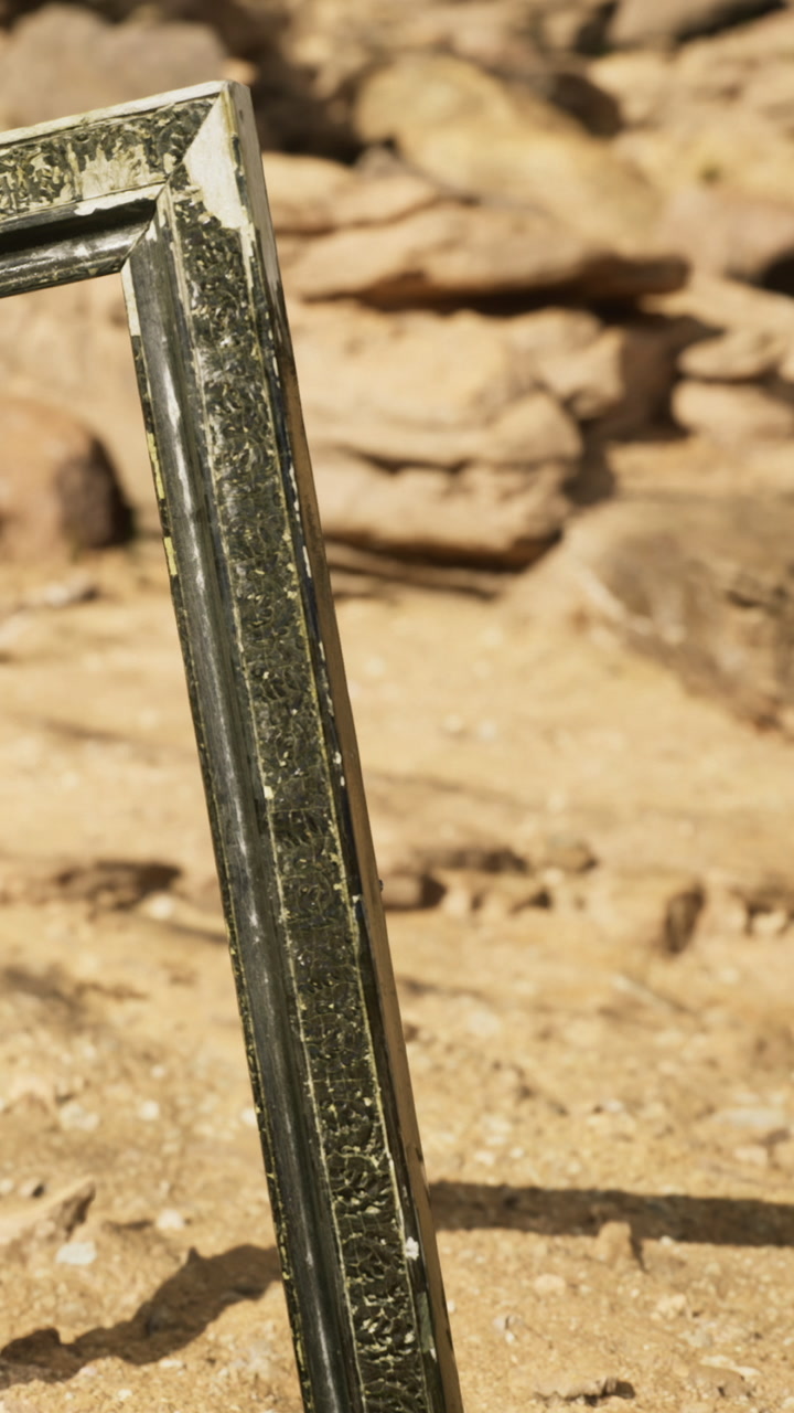 Reflections of nature captured in a rustic frame on rocky terrain