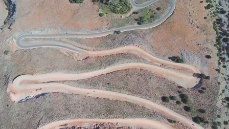 Breathtakingly-steep-and-curvy-roads-climbing-the-coastal-cliffs-of-the-Sfakia-region-of-Southern-Crete,-Greece