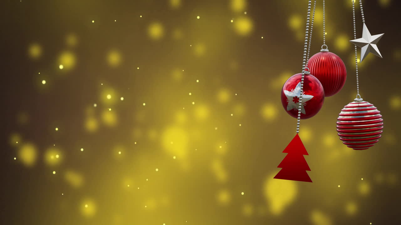 Animation of christmas baubles over light spots on black background