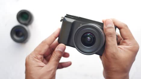 a men is taking pictures on a camera