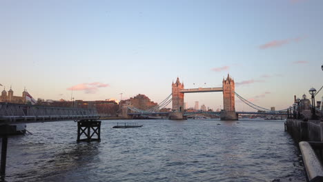 City skyline of Tower Bridge over River Thames surrounded by riverside