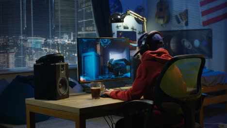teenager gaming at night