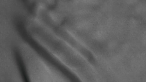 neutral gray fabric background waving in the wind. 4k