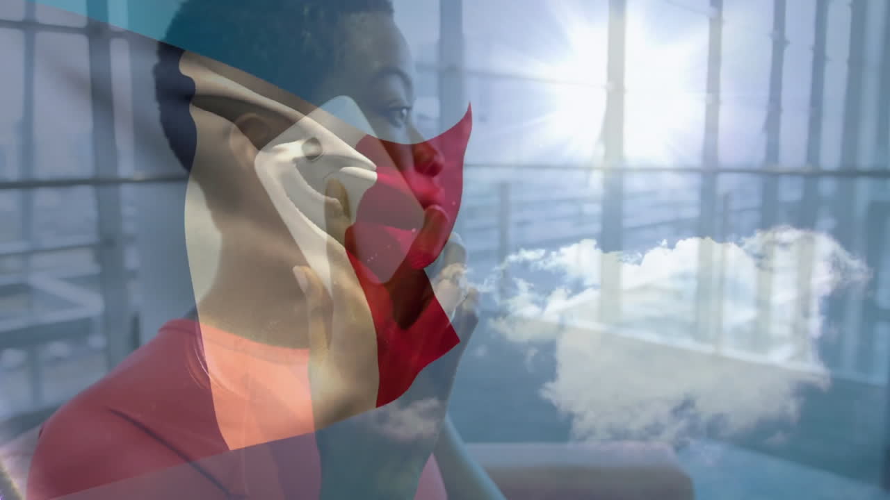 Talking on smartphone, person with flag and sky animation overlay in background