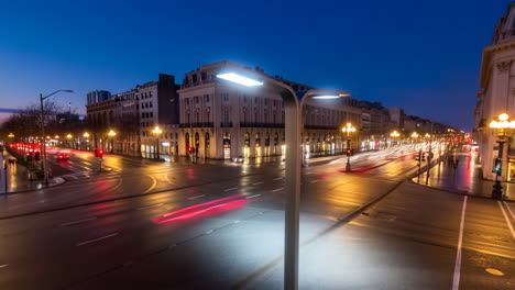 city intersection at night with light trails