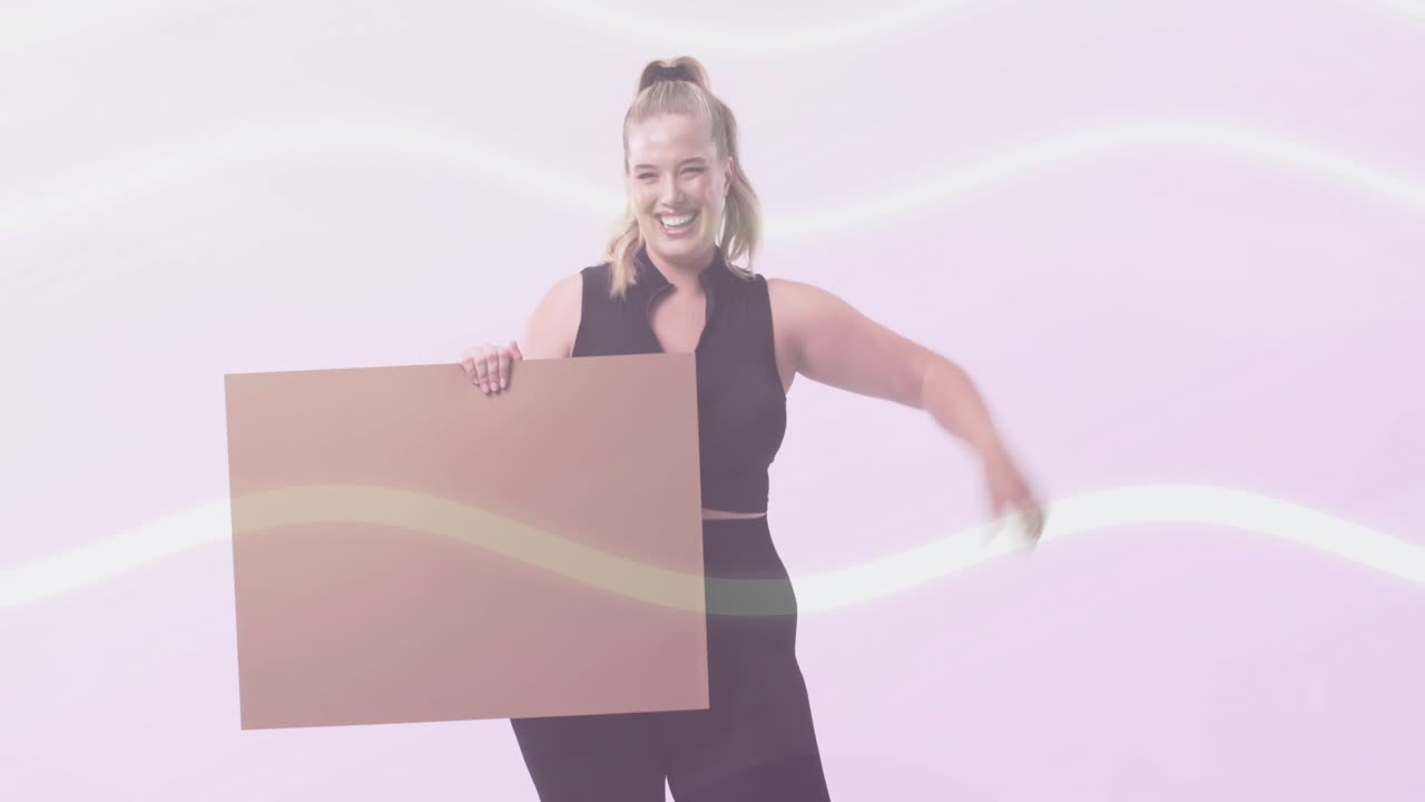 Woman holding blank sign glancing at sign sweeping arm flexing showing ads with pink waves behind