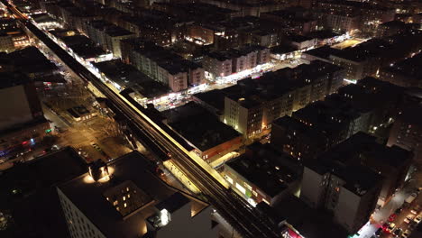 aerial view of the subway in the bronx. shot at night in new york city.