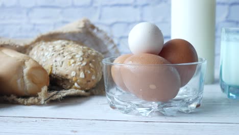 breakfast with eggs, bread, and milk