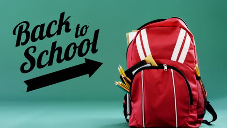 animación del texto de regreso a la escuela sobre la bolsa escolar sobre fondo verde