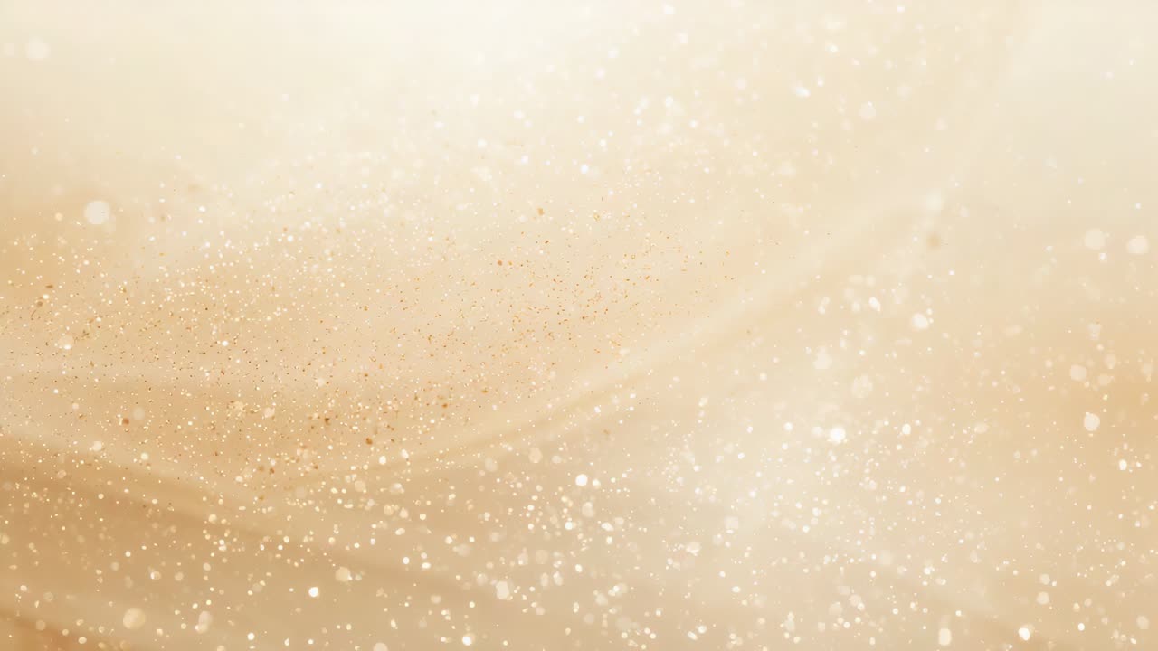 Campo di particelle dorate centrali scintillanti che fluttuano dopo una leggera luminescenza in un vortice dorato, con bokeh bianco