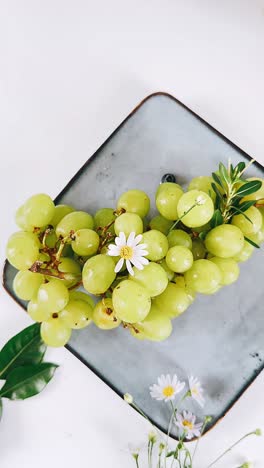 fresh green grapes with flowers