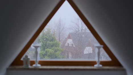 triangular window view on a cloudy day