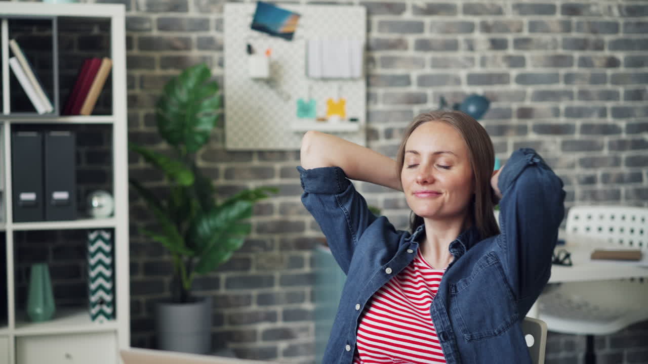 Woman working and relaxing in home office