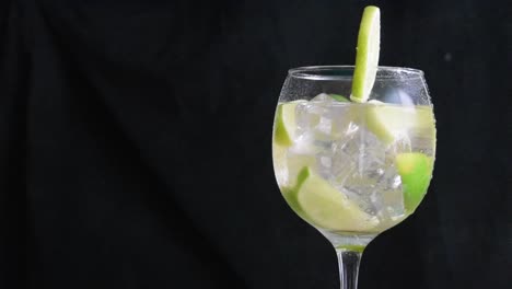 fresh glass of lemonade, with ice, lime and hint of mint