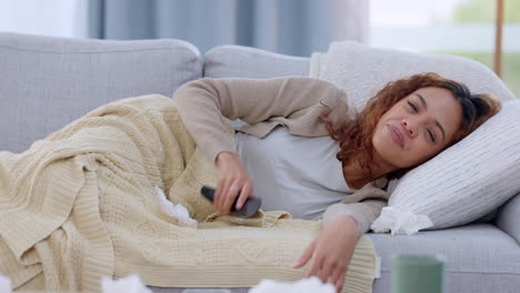 sick and ill woman with flu resting on the couch