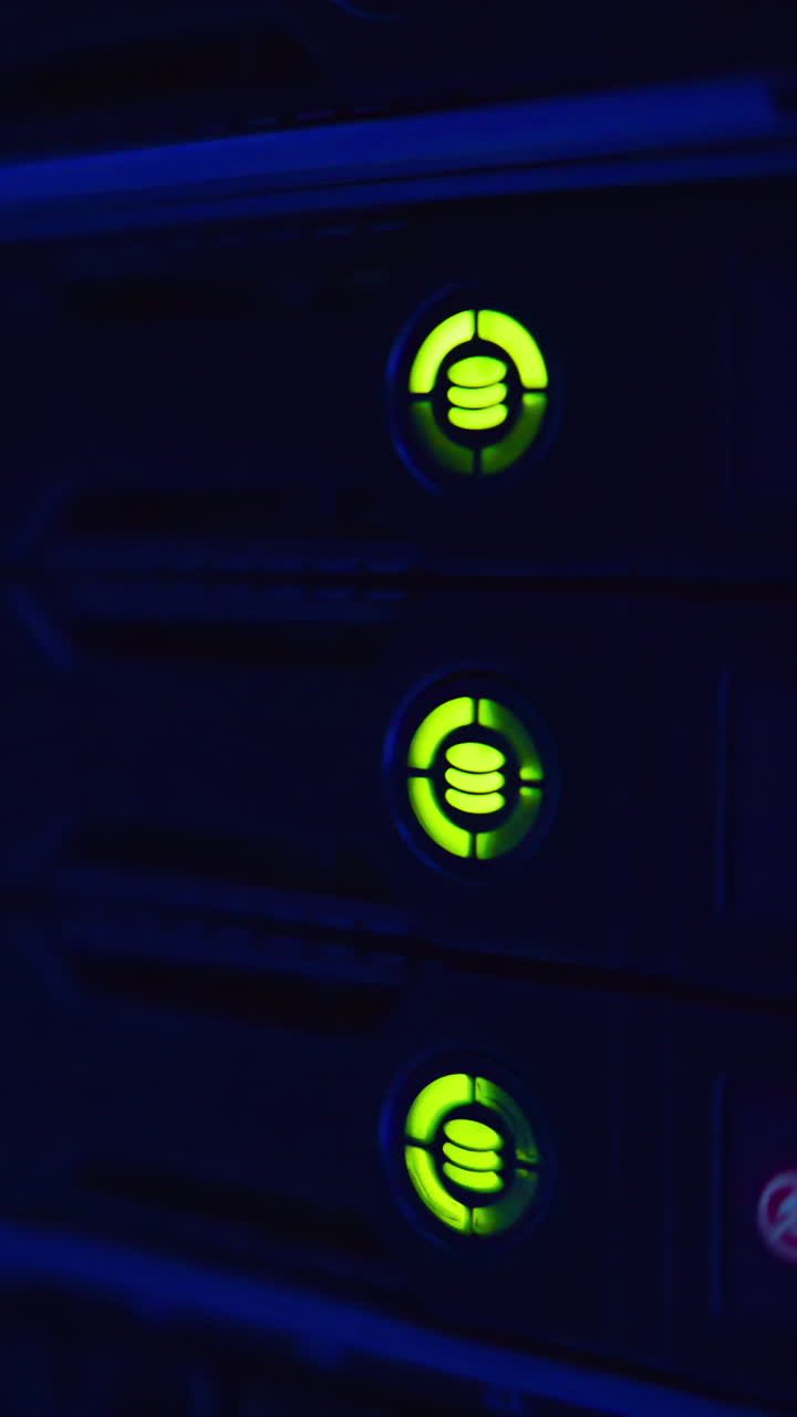 Alert signal with flashing red lights in a server room. Vertical