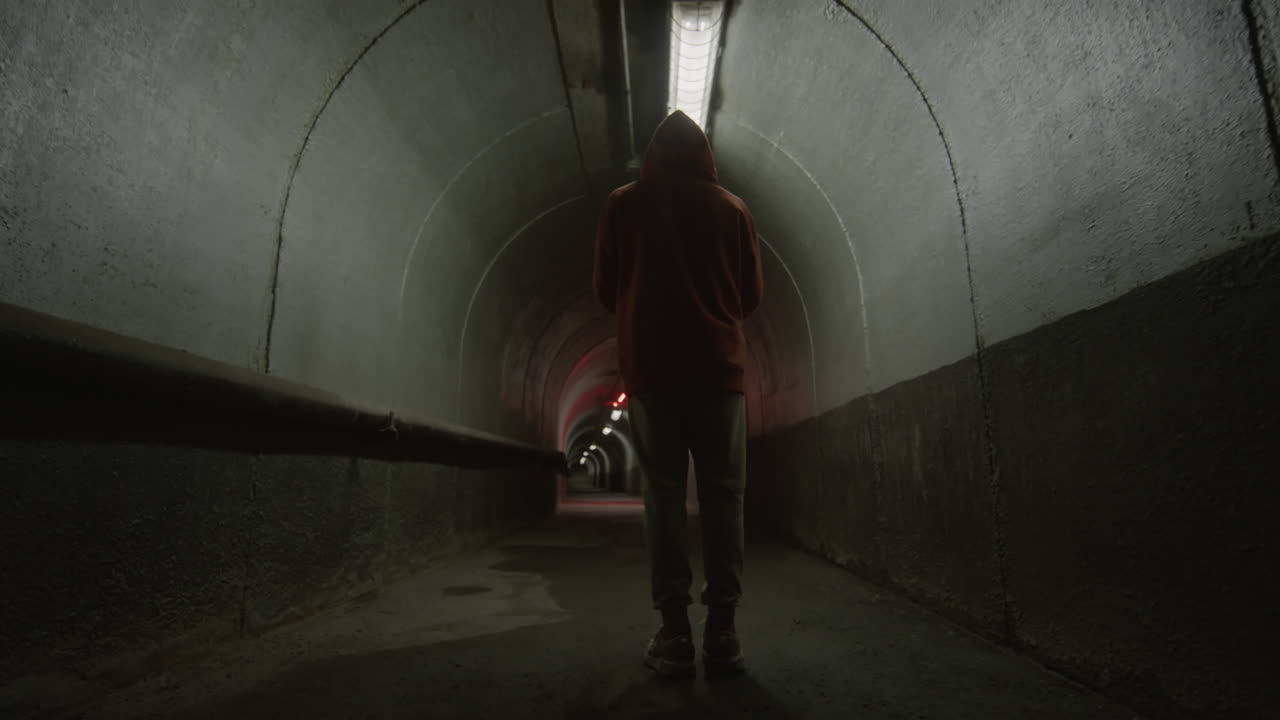 Parkour Athlete Freerunning in Concrete Tunnel