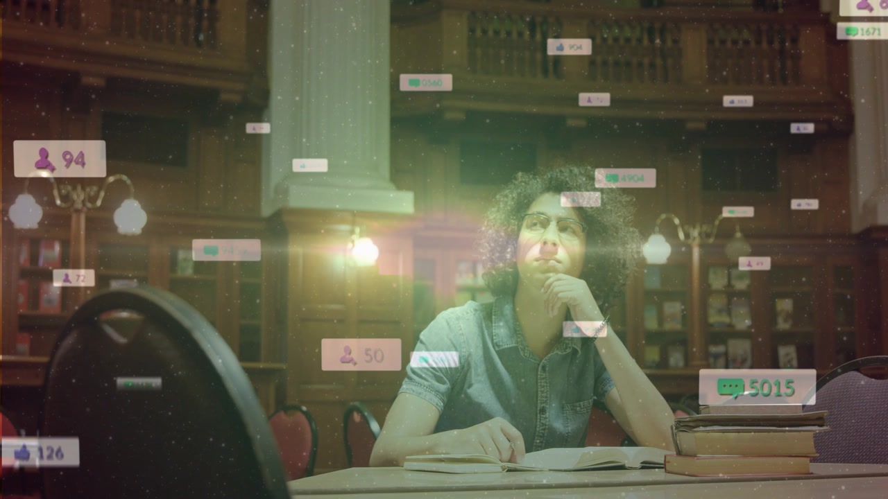 Student writing at table in library room, camera revealing overlays accumulating around him