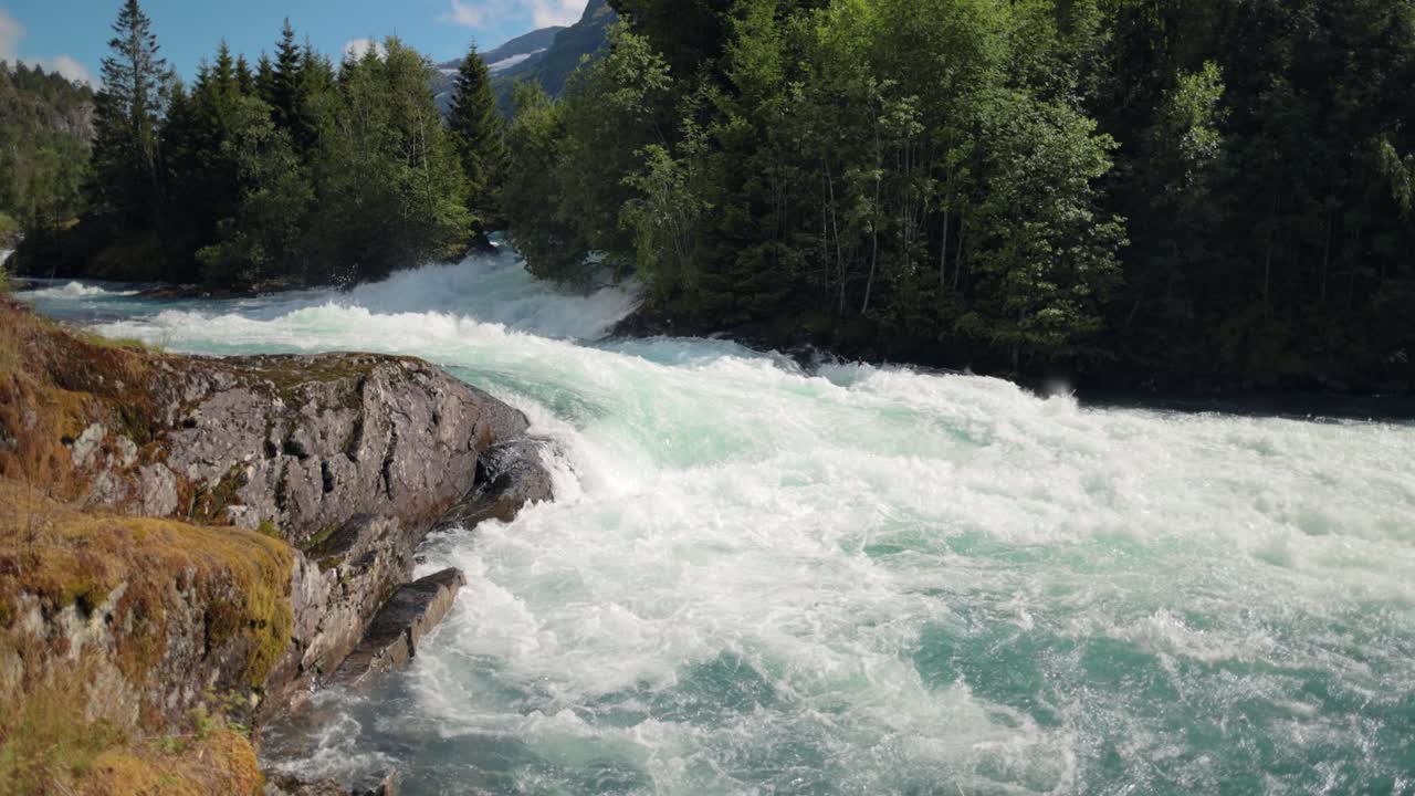 Mountain River Beautiful Nature Norway natural landscape. Lovatnet lake (also Loenvatnet) is a lake in the municipality of Stryn in Vestland county, Norway.