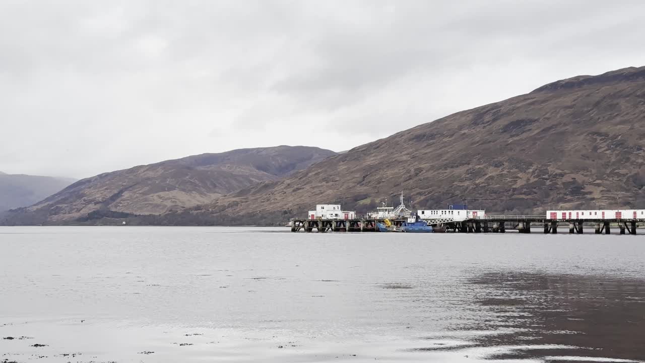 Calm cloudy day on Loch Eil, Fort William with The Pier in the foreground