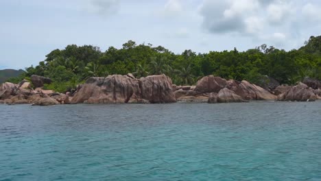 rocky coastline of curieuse island in the seychelles