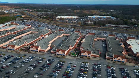 aerial view showing american shopping center and traffic in highway in georgia, america