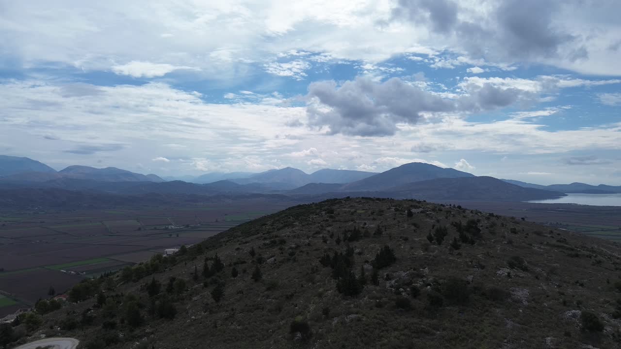 Stunning Aerial View of Mountains and Farmland