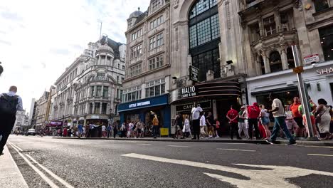 pedestrians and traffic in central london street