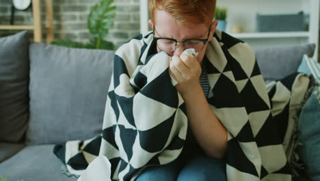 sick person on a sofa