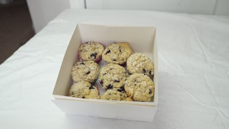 gift box full of blueberry muffins - parallax sliding motion