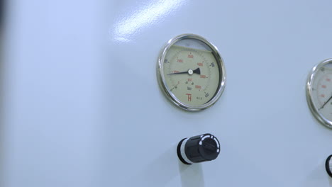 Pressure-gauge-measuring.-Closeup-of-manometer-filled-with-glycerin