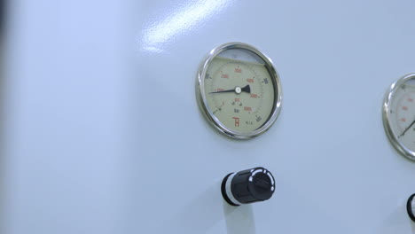 pressure gauge measuring. closeup of manometer filled with glycerin