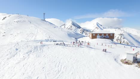 snowy mountain ski resort with people