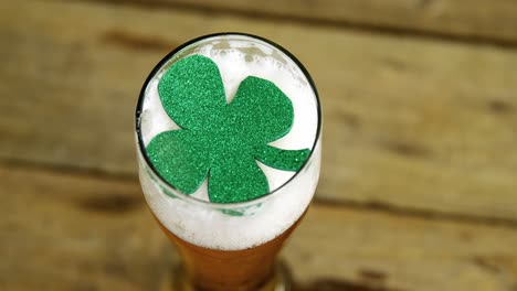 Bird-eye-view-of-shamrock-in-head-of-beer-pint-for-st-patrick